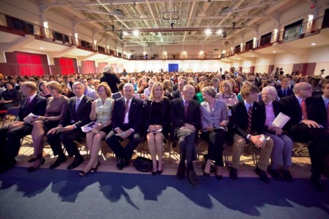 The audience waits for the arrival of Tony Blair.