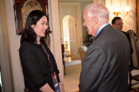 Seo-Hyun Park, assistant professor of government and law, meets President Jimmy Carter.