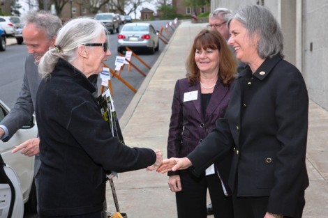 Jane Goodall is greeted by Provost Wendy Hill (right). Marie Enea, assistant to the president, looks on.