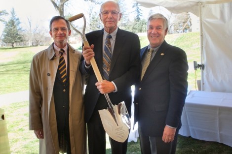 Walter Oechsle ’57, center, holds the ceremonial shovel with President Daniel H. Weiss, left, and Edward W. Ahart ’69, chair of the Board of Trustees