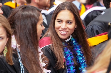 Students share a laugh during the ceremony.