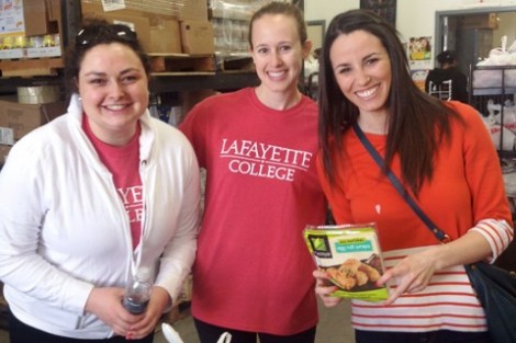 Kate Ellis '08 (left), Becca Nickerson '08, and Carli Siger '07 at the Boston Red Cross Food Bank