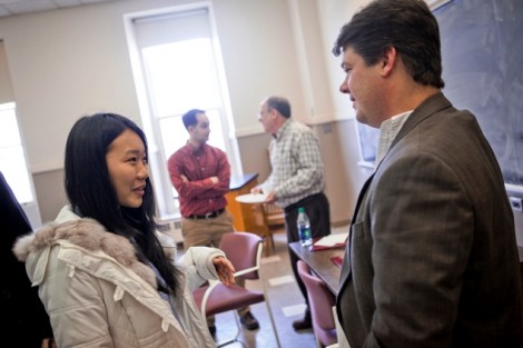 Yemai Liu '15 chats with Kevin O’Brien ’96. 