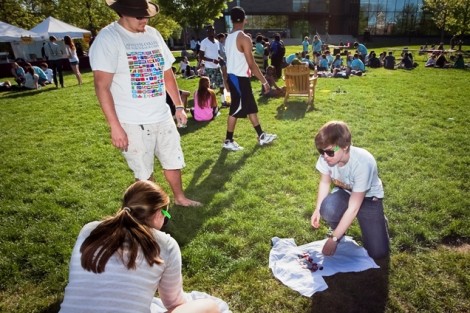Students make tie-dyed T-shirts.