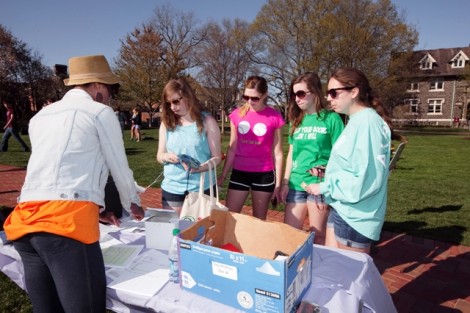 Jessica London '13, Marcia Molettieri '14, Rachel Leister '15, and Stacy Widerman '15 sign up for the relay as part of Alpha Gamma Delta sorority team.