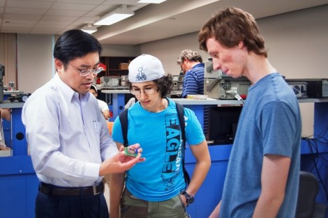 Yih-Choung Yu (left), associate professor of electrical and computer engineering, gives advice to Ross Chumsky '16 and Tom Fuller '16.