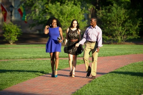 Alumni walk along the new brick paths on the Quad during  the Class Socials Campus Crawl. 