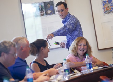 Daniel Sabatino, professor of mechanical engineering, captivates the class with his demonstrations and discussion about the flow of air around objects. 