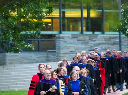 Ilan Peleg, Dana Professor of Government and Law, and Provost Wendy Hill lead the academic procession.
