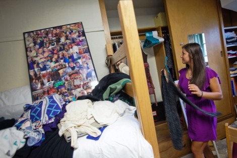Lauren Tracy '17 sets up her room in McKeen Hall.