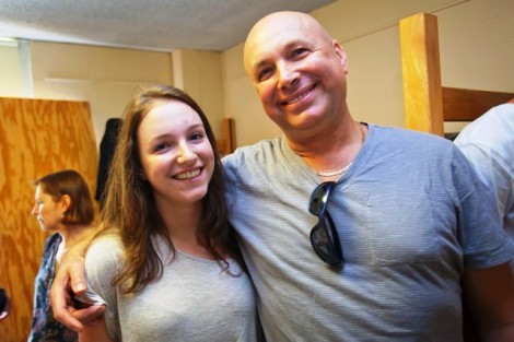 Samantha Buczek '17 and her dad, Janusz, take a break from unpacking to pose for a photo in Ruef Hall.
