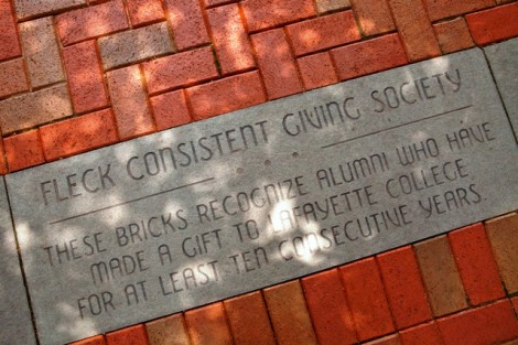 Members of the Fleck Consistent Giving Society are recognized along the brick walkway by Skillman Library.