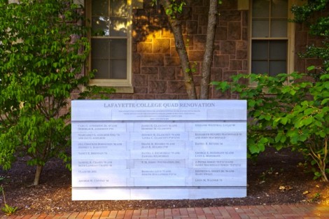 A stone plaque recognizing the major donors to the Quad project stands outside Pardee Hall.