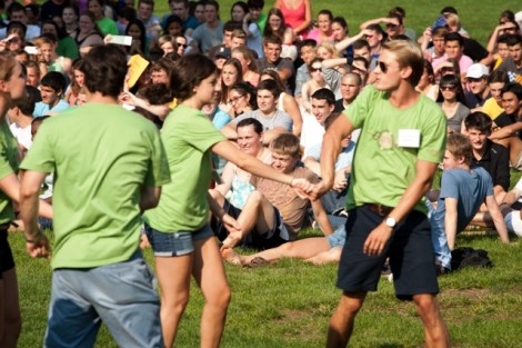 Orientation leaders do a song-and-dance number to entertain the first-year students.