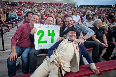 The Marquis de Lafayette greets people in the stands.
