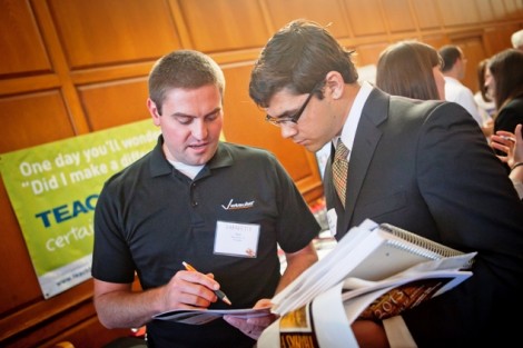 Matt Hontz ’05, left, of Victaulic gives Alexander Amador ’15, a double major in international affairs and Spanish, an overview of the company.