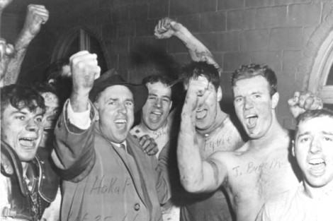 Head coach Steve Hokuf and the Leopards celebrate after winning the game in 1955.