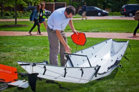 An origami kayak is assembled.