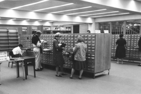 Students and faculty looking through Skillman's card catalog in 1963.