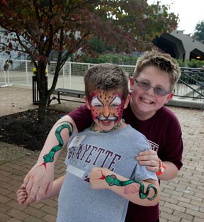 Elliott Petr, 7, Leopard face, and brother Zachary Petr, 9