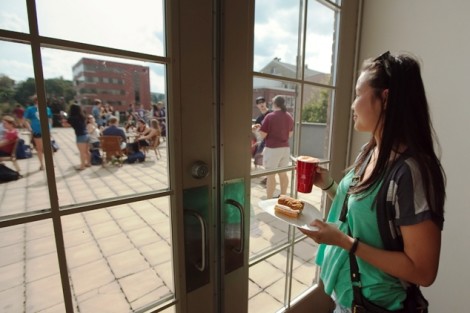 Helen Xu '14 looks out at the terrace from the Gold Room of the Grand Eastonian Hotel.