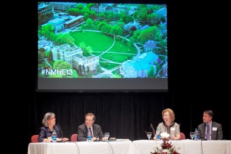 The panel discusses 'New Models for Higher Education.'