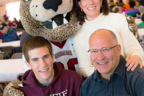 The Leopard joins Ethan Ossolinski '17 and his parents, Julie and Andrew, at the Anything Goes Family Lunch.