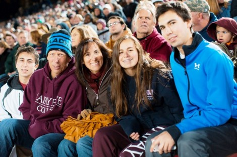 Peter Levine '16, far right, watches the game with his brother, Jordan (left-right), dad, Kenny, mom, Jodi, and sister, Rachel. 