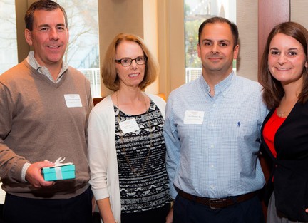 Jim Hummerstone '86 (left) and Vincent Petitto '89 received Externship Commitment Awards from Linda Arra '74 and Melissa Schultz.