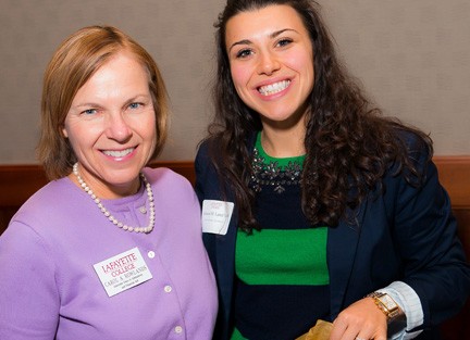 Kristen Lanzi '08 (right) receives New AAR of the Year Award from Carol Rowlands '81, associate dean of admissions.