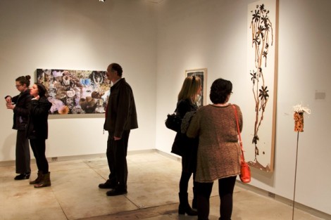 Visitors explore the gallery during the reception.