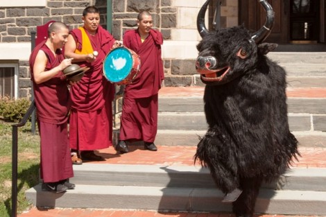 A traditional yak dance is performed on the Quad in front of Hogg Hall.