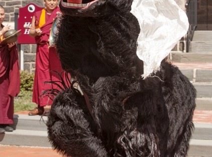 A traditional yak dance is performed on the Quad in front of Hogg Hall.