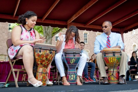 Jenny Mena ’14, from left, Shanequa Lassiter ’14, and Abenezer Solomon ’14 perform 'Tongues and Hands Untied,' a spoken word and percussion piece.
