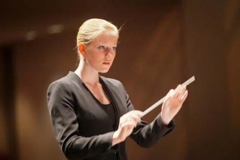 Assistant conductor Madeline Friese '14 directs her fellow students.