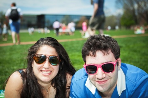 Stephanie Kass ’14 (left) and Jonathan Kaplowitz ’14 enjoy the sun on the Quad.