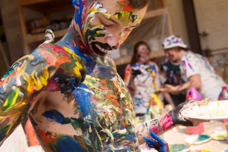 Adin Kugelmass '16 gets covered in paint.
