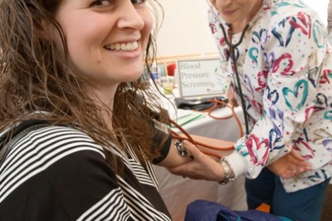 Roxy Swails, visiting assistant professor of chemistry, gets her blood pressure checked.
