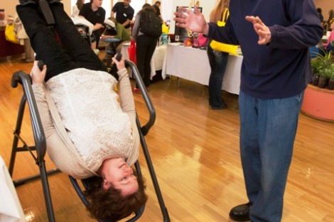 Nancy Waters, associate professor of biology, tries out an inversion table.