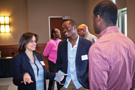 Rosemary Ellis '08 and Roger Ellis '07 mingle with students.