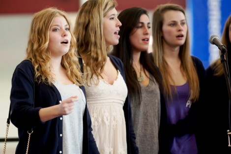Members of the Cadence female a cappella group entertain the crowd.