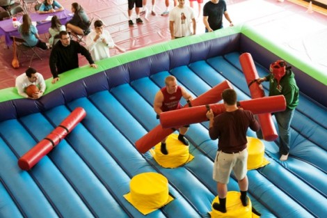 Students play bouncy joust. 
