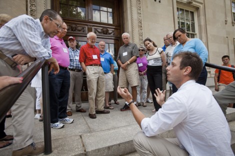 Prof. David Sunderlin describes the fossils embedded in the stones on the facade of Kirby Hall of Civil Rights.