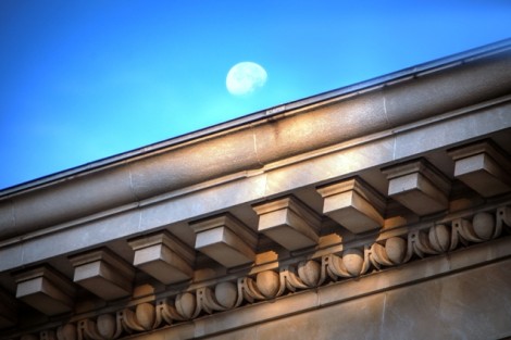 The moon rises over Kirby Hall of Civil Rights.