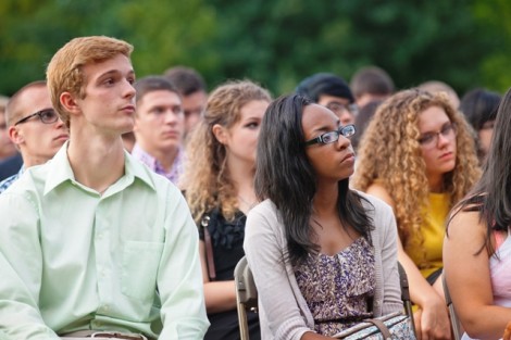 Students listen during the ceremony.
