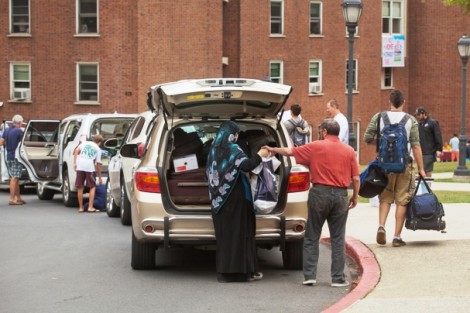 Students and families unload along South College Drive.