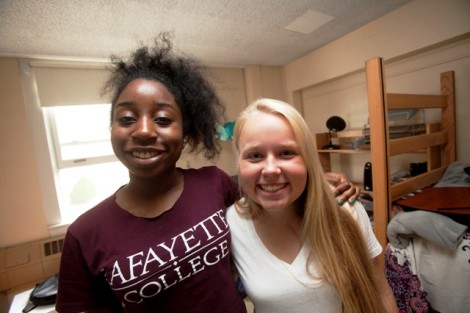 Roommates Imani Ford ’18, left, and Merinda Hansen-Kemp ’18 meet in Ruef Hall.