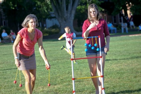 Family members play ladder golf on the Quad.