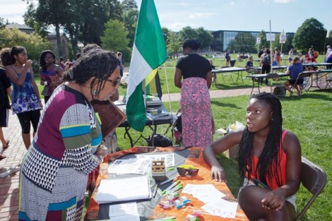 Professor Wendy Wilson Fall speaks with a student about NIA (Multicultural Women’s Support Group).