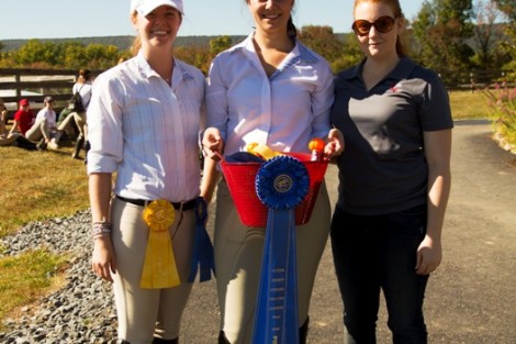 Shannon Lenahan '15, Rebekah Scharfe '15, and coach Erin Githens ’06 pose with the first-place team ribbon from the Sept. 27 competition.